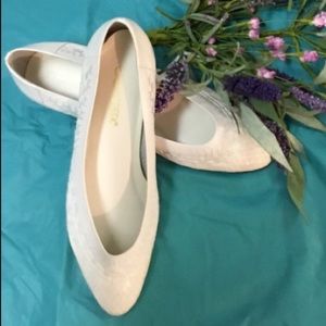 White leather flats